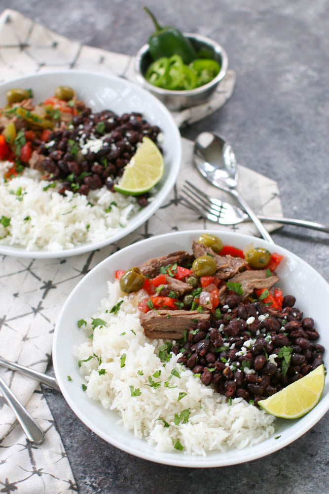 Slow Cooker Ropa Vieja is a traditional Cuban dish with tender chuck roast, bell peppers, tomatoes, olives, and spices. Ten minutes of prep time is all it takes to have this comfort food ready for a weeknight dinner after a busy day. Serve with rice and black beans for a meal that never disappoints.