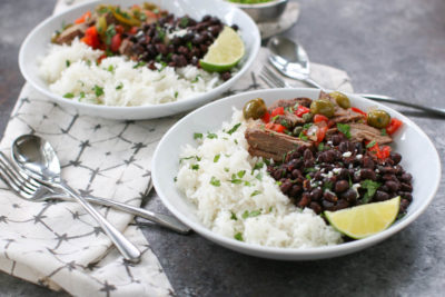 Slow Cooker Ropa Vieja is a traditional Cuban dish with tender chuck roast, bell peppers, tomatoes, olives, and spices. Ten minutes of prep time is all it takes to have this comfort food ready for a weeknight dinner after a busy day. Serve with rice and black beans for a meal that never disappoints.