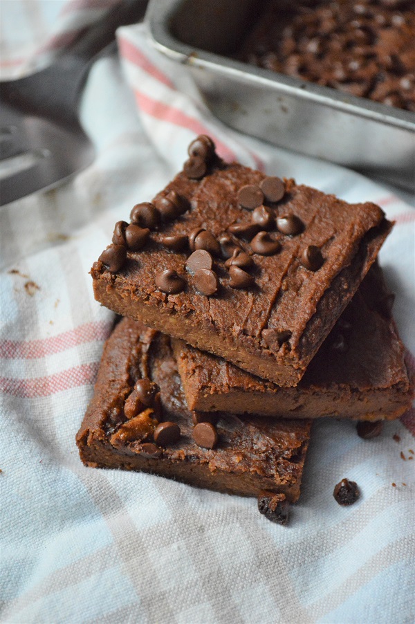 These Sweet Potato Brownies combine the very best fall flavors. Made without flour, refined sugar, oil, or dairy which makes this a healthier treat. Everyone will love this vegan and gluten-free dessert!