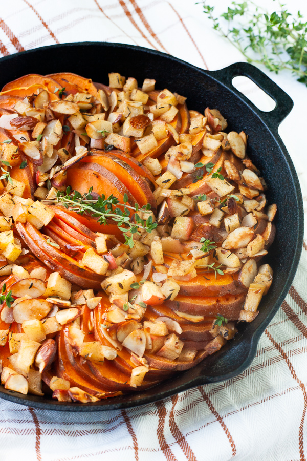 Looking to be the potluck hero this year? This Savory Sweet Potato Apple Bake is full of fall flavors and perfect as a holiday side dish. A one-pan dish flavored with fresh thyme and warming spices.