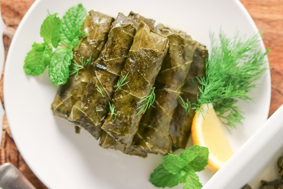 These Stuffed Grape Leaves are a rice-filled, Mediterranean appetizer or side dish flavored with mint, dill, and lemon. These Vegetarian Dolmas are a healthy comfort food perfect for entertaining and potlucks
