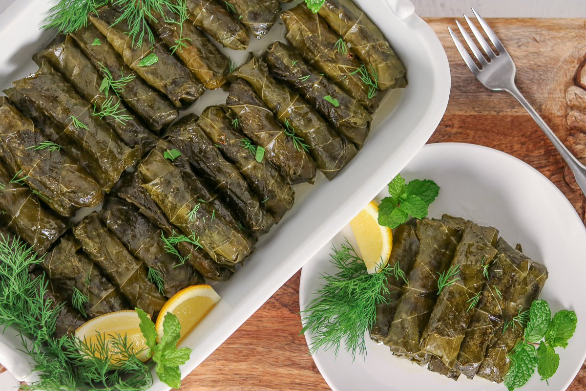 These Stuffed Grape Leaves are a rice-filled, Mediterranean appetizer or side dish flavored with mint, dill, and lemon. These Vegetarian Dolmas are a healthy comfort food perfect for entertaining and potlucks