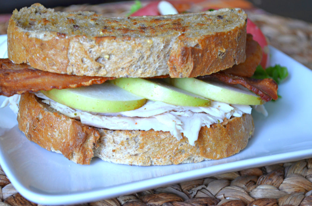 Create a simple deli-style meal at home with this amazing Turkey Bacon Apple Deli Sandwich. Just 5 ingredient, 572 calories, and only 20 minutes of your time deliver the best budget-friendly meal you'll ever enjoy!