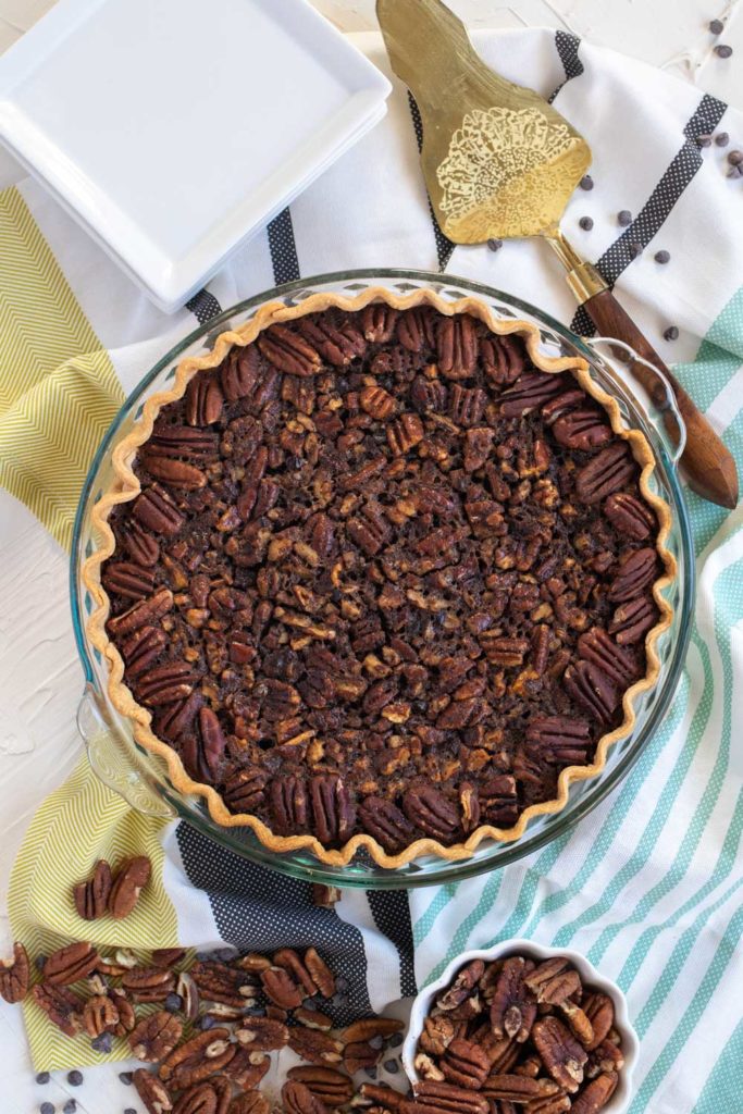 Why settle for a store-bought, classic pecan pie when you can easily make this homemade Chocolate Pecan Pie instead? The chocolate, brown sugar, and corn syrup lend plenty of sweetness to the pecan pie filling. You'll find that a small slice is all you need to satisfy your sweet tooth!