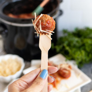 These Slow Cooker Italian Sausage Meatballs smothered in marinara sauce can be served as a party appetizer right out of the Crock Pot, alongside your favorite pasta dish, or in sliders with a sprinkle of Parmesan.